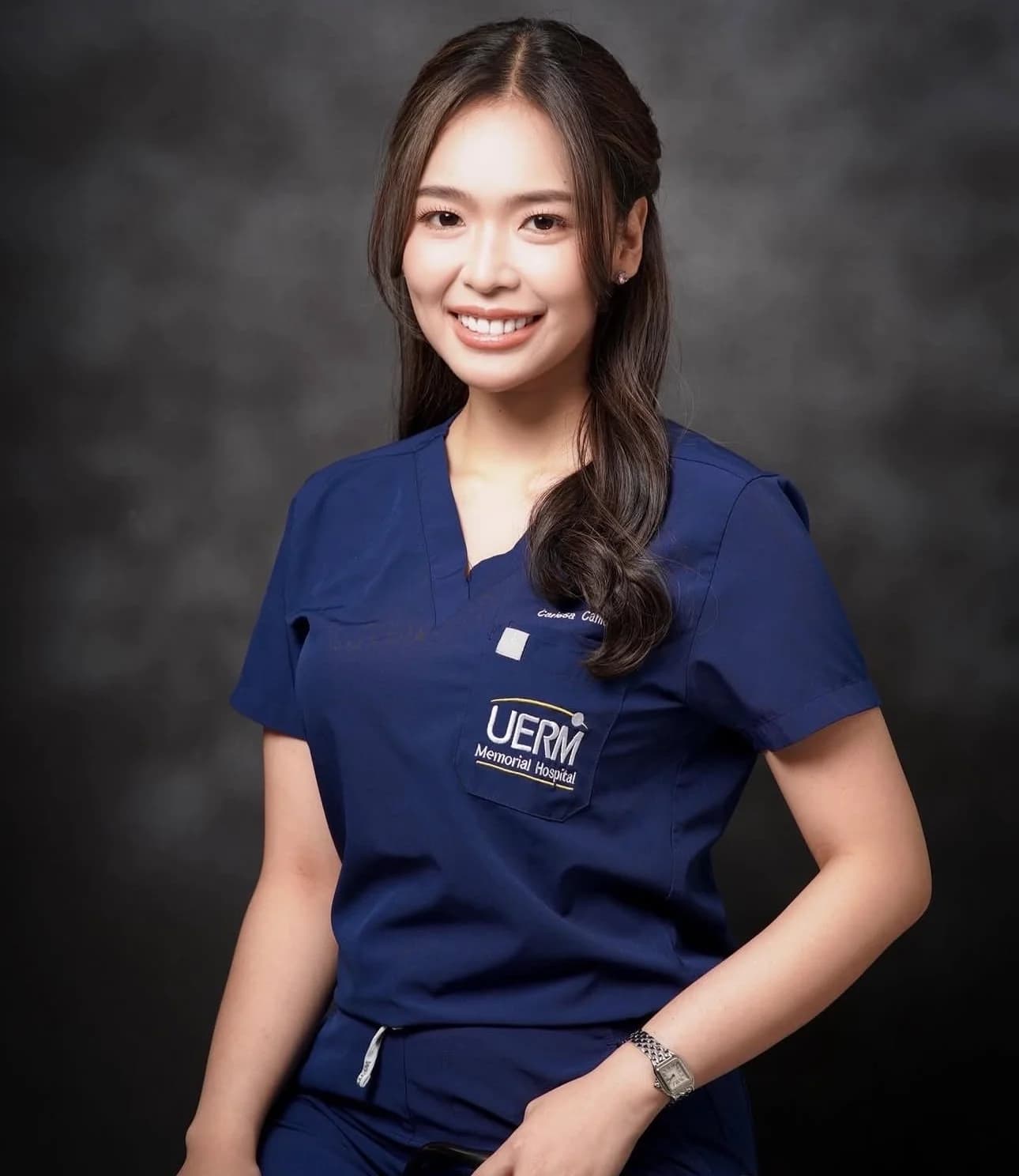 Dr. Issa Canlas in a white coat